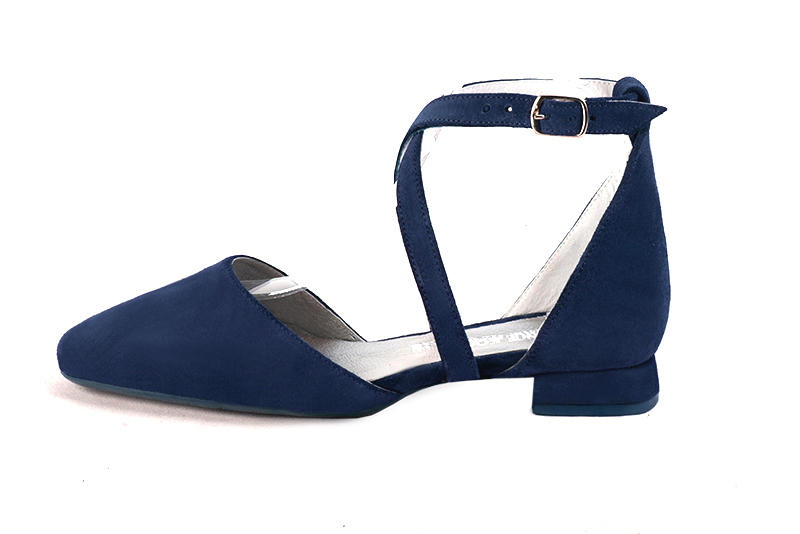 Navy blue women's open side shoes, with crossed straps. Square toe. Flat flare heels. Profile view - Florence KOOIJMAN